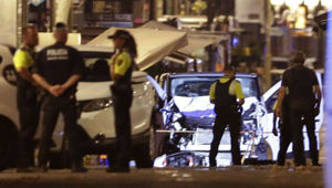 Injured people are treated in Barcelona, Spain. (Photo / AP)