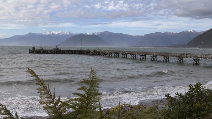 Police said in a statement that a light plane spotted debris and a life raft on the water near Jackson Bay about 11.30am and contacted emergency services.