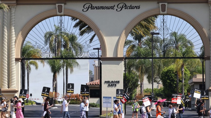 Members and supporters of SAG-AFTRA and WGA walk the picket line at Paramount Studios on August 07, 2023 in Los Angeles, California. David Livingston/Getty Images