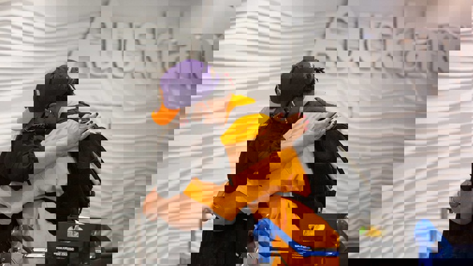 Joshua Gray hugs mum Clara after arriving from Dubai. They were among families reunited as the first international flight not subject to MIQ rules arrived at Auckland in March. Photo / Sylvie Whinray