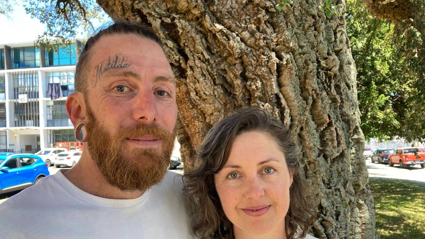 Luke Shackleton, AKA "Living Man Luke", with his wife Rosy Orchard outside the Nelson District Court. Photo / Tracy Neal