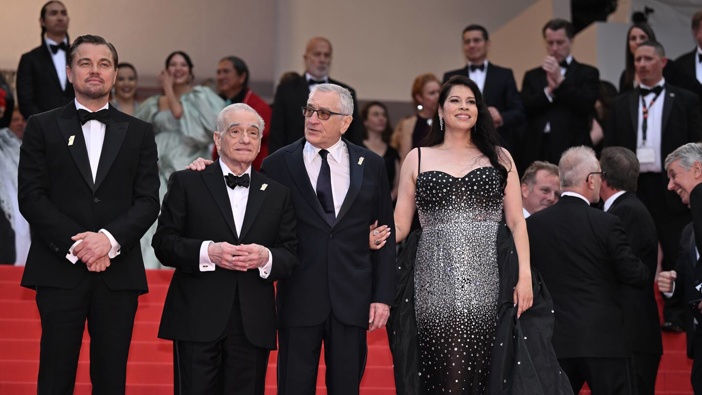 From left: Leonardo DiCaprio, director Martin Scorsese, Robert De Niro, and Cara Jade Myers at the Cannes premiere of Killers of the Flower Moon. Photo/ Getty Images