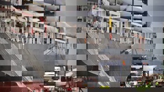 Workers unloading the first of the new wind farm blades off of the Pacific Endeavour. Photo / Warren Buckland