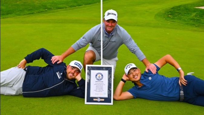 Dan Bradbury, Ryan Fox and Dan Bradbury celebrate their world record. Photo / DP World Tour