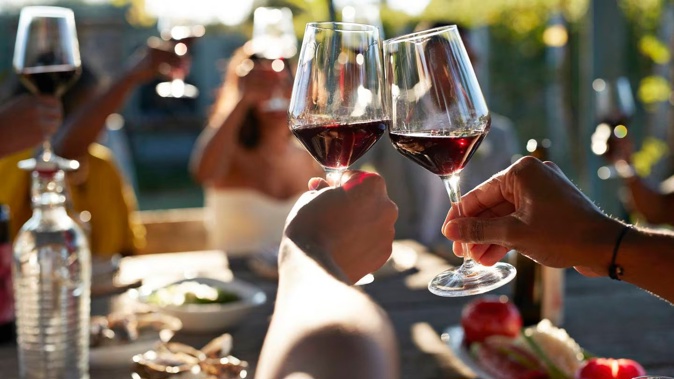Why is it that red wine can bring on such a severe headache for some people? Photo / Getty Images