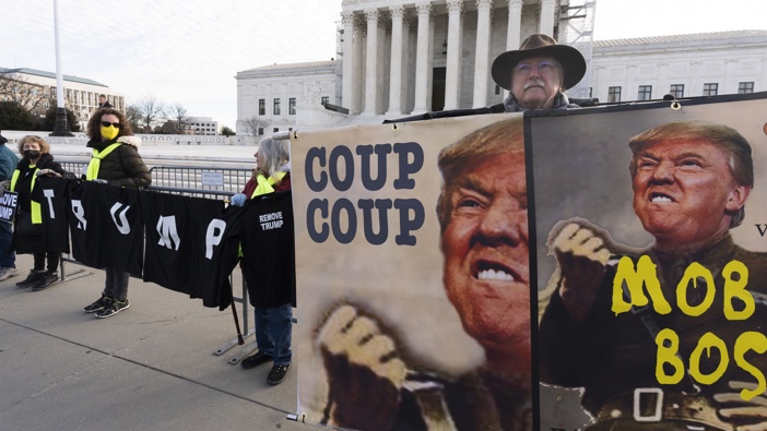 Protesters hold their banners in front of the U.S. Supreme Court, Thursday, Feb. 8, 2024, in Washington. Photo / AP