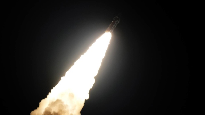 Nasa's new moon rocket lifts off from Kennedy Space Centre's Launch Pad 39-B. Photo / AP