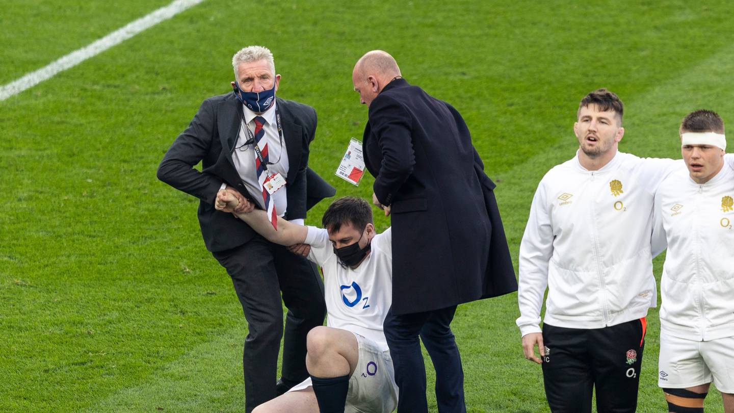 Security apprehend an intruder during the Guinness Six Nations Rugby match between England and Ireland at Twickenham Stadium. (Photo / Getty)
