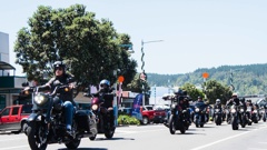 Band Devilskin ride through Port Rd Whangamata as they get ready to rock Joe's Farm at this weekend's Kickdown Festival. (Photo / Paddy Neale)