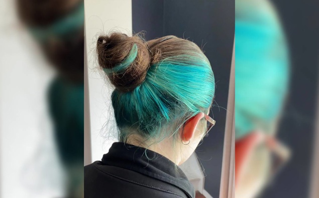 Student with blue hair fired from supermarket awarded nearly $10k