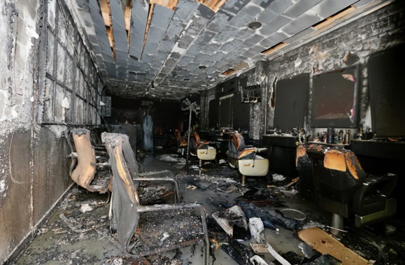 A fire at Bentley's Barber shop on Manukau Rd in Royal Oak is being treated as arson. Photo / Alex Burton