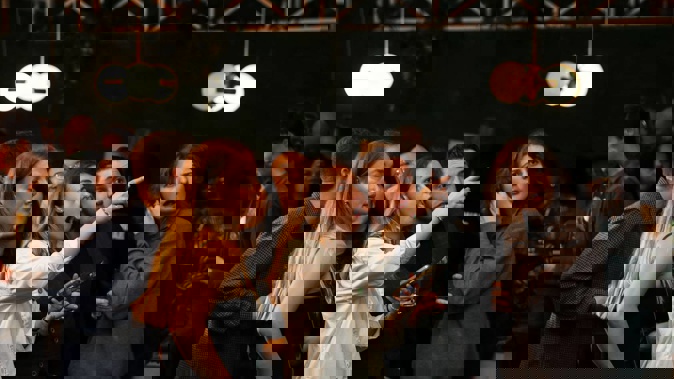 Green Party supporters react to their party's early results. Photo / Michael Craig