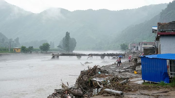 More than 80,000 people have been evacuated in the Chinese capital alone because of the intense rainstorms. Photo / Getty Images
