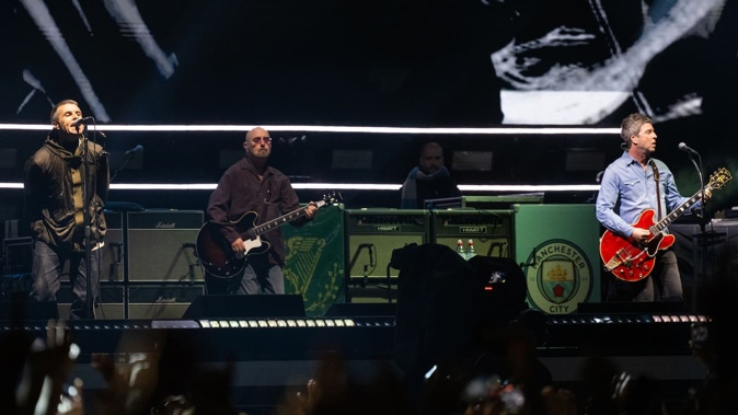 Liam Gallagher (left) and Noel Gallagher (right) of Oasis perform during the opening night of their Live 25' Tour at Principality Stadium on July 4, 2025 (local time) in Cardiff, Wales. Photo / Samir Hussein / WireImage via Getty Images