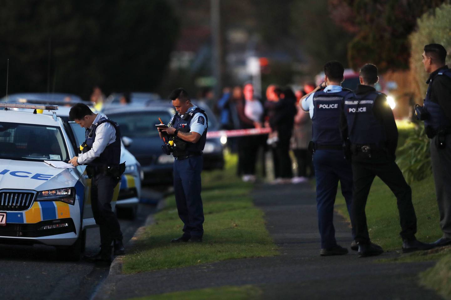 Police at the scene on Casuarina Rd last night. Photo / Dean Purcell