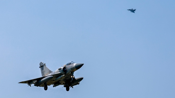 Two Taiwanese Air Force Mirage 2000 fighter jets armed with missiles are being deployed from the Hsinchu Air Base, following China's announcement of the military exercise Joint Sword-2024B that encircles Taiwan, in Hsinchu, Taiwan on October 14, 2024. Photo / Daniel Ceng/Anadolu via Getty Images
