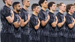 Players of the New Zealand All Whites stand together for the national anthem before their international friendly match against The Gambia. (Photo / Photosport.co.nz)