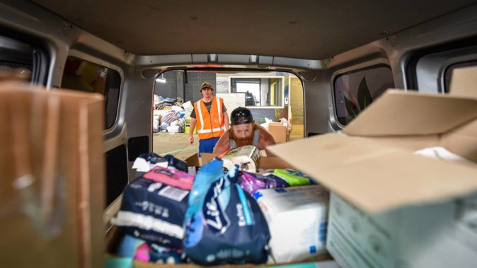 Environment Centre Hawke’s Bay volunteers working hard to get supplies out to those affected by Cyclone Gabrielle. Photo / Ian Cooper
