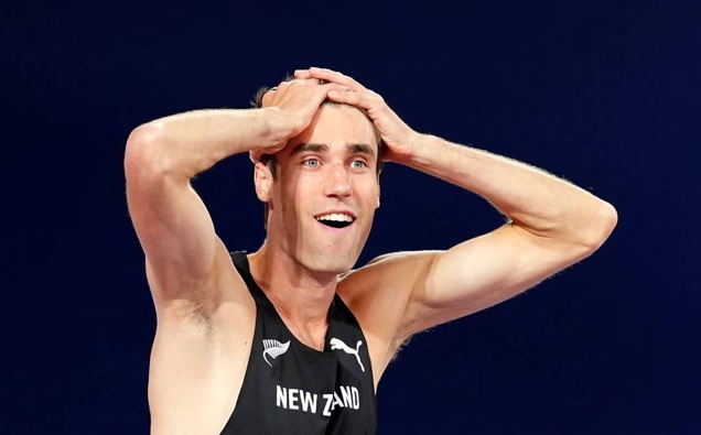 New Zealand's Hamish Kerr celebrates after winning the men's high jump during day three of the World Indoor Athletics Championships in Glasgow. Photo / Getty Images