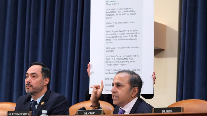 US Representatives Raja Krishnamoorthi and Joaquin Castro in front of Signal messages by Defense Secretary Pete Hegseth during a hearing with top aides from the Trump administration about the group chat. Photo / Getty Images