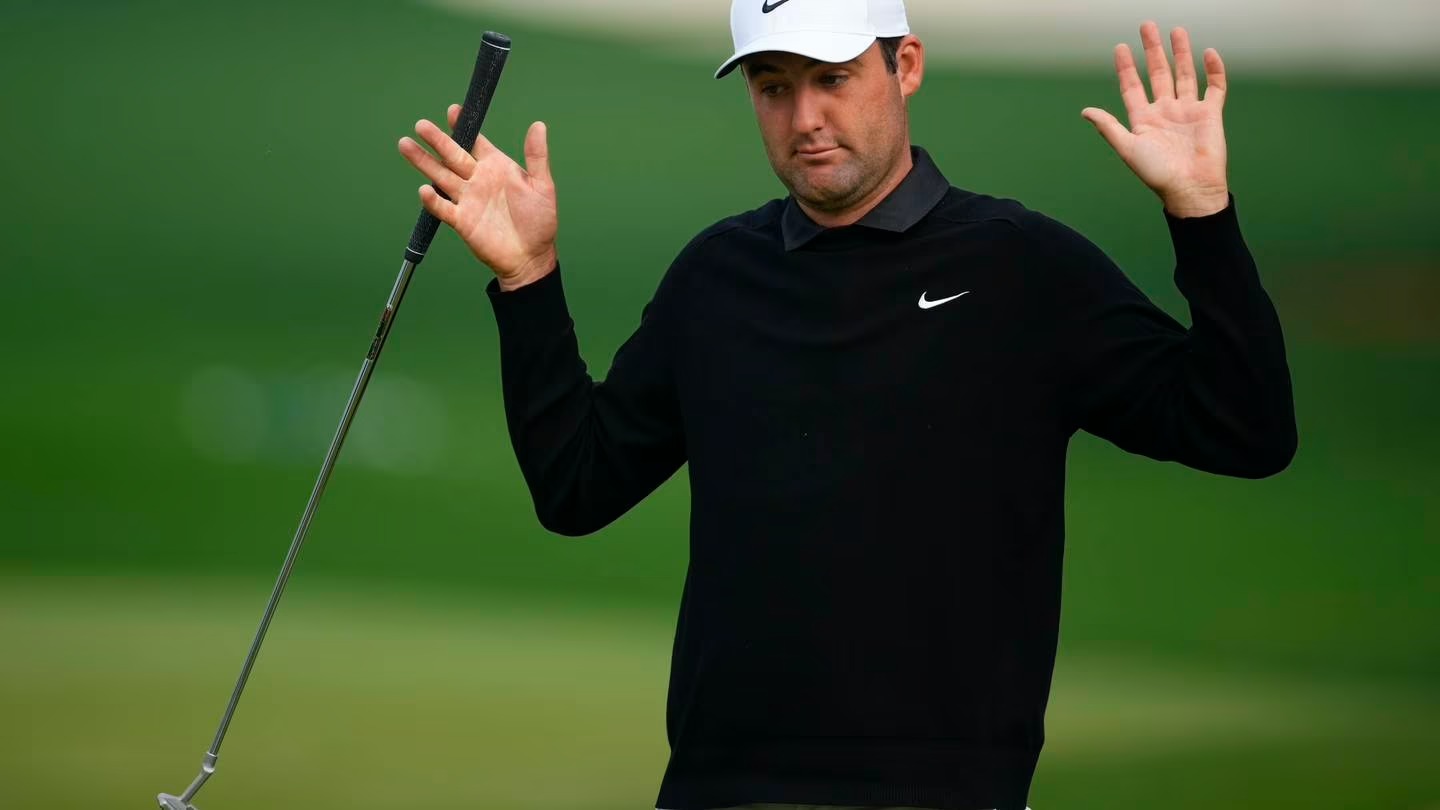 Scottie Scheffler works out on the putting green during a practice for the Masters golf tournament at Augusta National Golf Club. Photo / AP