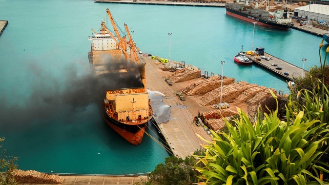 Firefighters tackle the blaze on the Kota Bahagia at the Port of Napier in December 2020. Photo / Paul Taylor