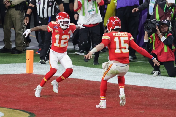 Patrick Mahomes and Mecole Hardman celebrate their Super Bowl-winning play. Photo/Getty Images