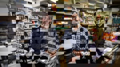 Ronark Patel, the manager at Ponsonby's BP 2go reunites with Alice Tolich, the "angel" paramedic who came to his rescue and tended to his injuries. Photo / Jason Oxenham.