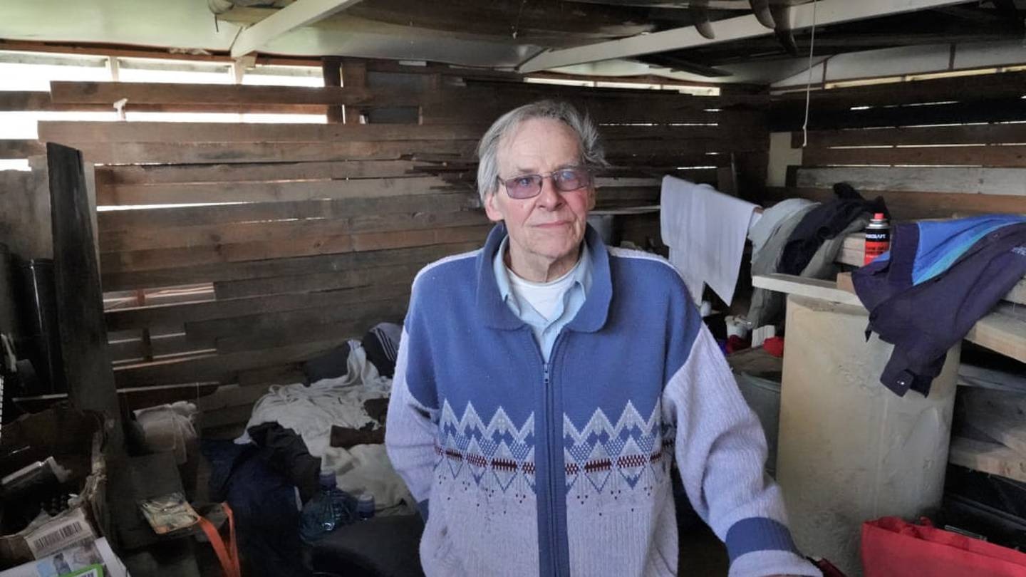 Arnold Kalnins, 80, has been sleeping on a mattress on the floor of a tool shed since his home was destroyed by fire. Photo / Peter de Graaf