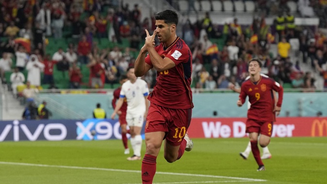 Spain's Marcos Asensio celebrates after scoring his side's second goal against Costa Rica. Photo / AP