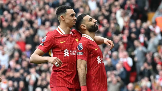 Liverpool's Mohamed Salah and Trent Alexander-Arnold celebrate in victory over Southampton. Photo / AFP