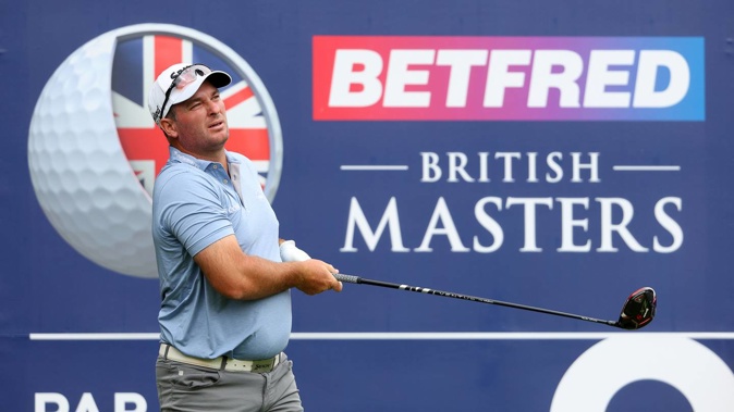 Ryan Fox of New Zealand tees off on the ninth hole during the first round of the British Masters. (Photo / Getty)