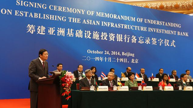 The Chinese foreign minister addresses a meeting for the Asian Infrastructure Investment Bank (Getty Images)