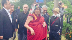 Dalai Lama spoke for an hour at Glastonbury Festival about how the world could be a happier place ( Kaya Burgess / Twitter)