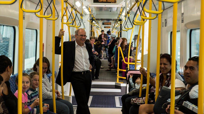 Mayor Len Brown taking a ride on an electric train (Supplied)