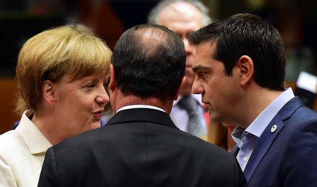 Greek PM Alexis Tsipras talks with German Chancellor Angela Merkel (Getty Images) 