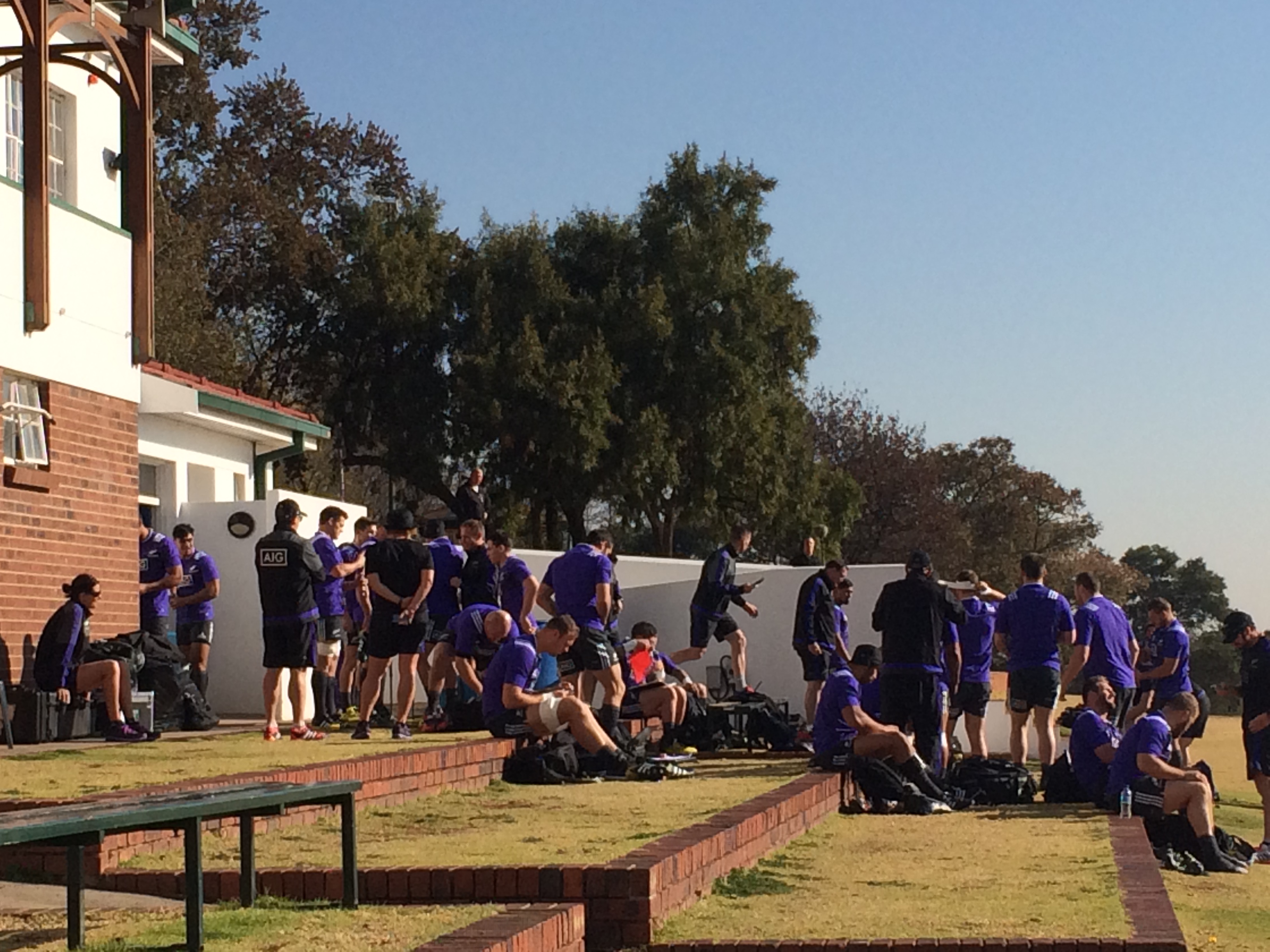 The All Blacks relaxing during a break in training. 