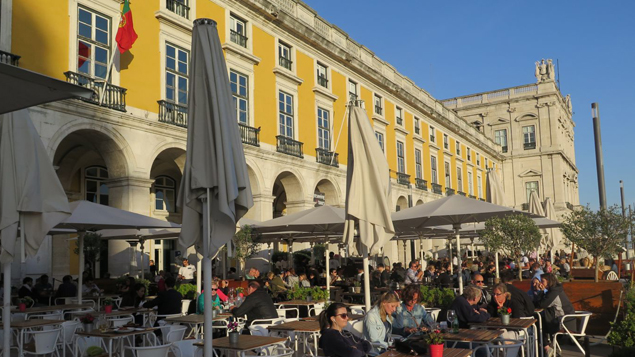 An outdoor cafe at Commerce Square in Lisbon. 