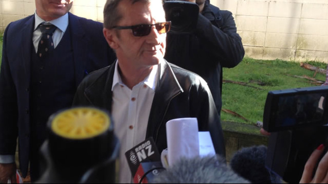 Phil Rudd appears outside court this morning. (Georgia Nelson)
