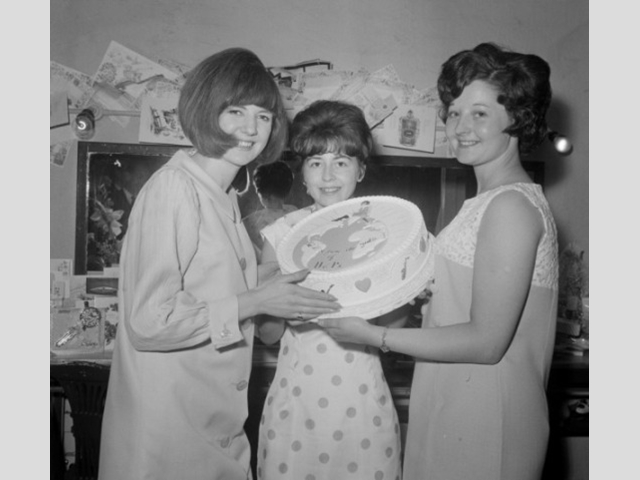 Cilla, pictured left, celebrating her 21st birthday backstage at Top Of The Pops studio in 1964.