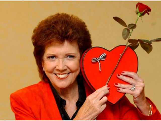 During a photocall for ITV show Blind Date at the New Connaught Rooms in London. The show ran on Saturday nights from November 1985 to May 2003.