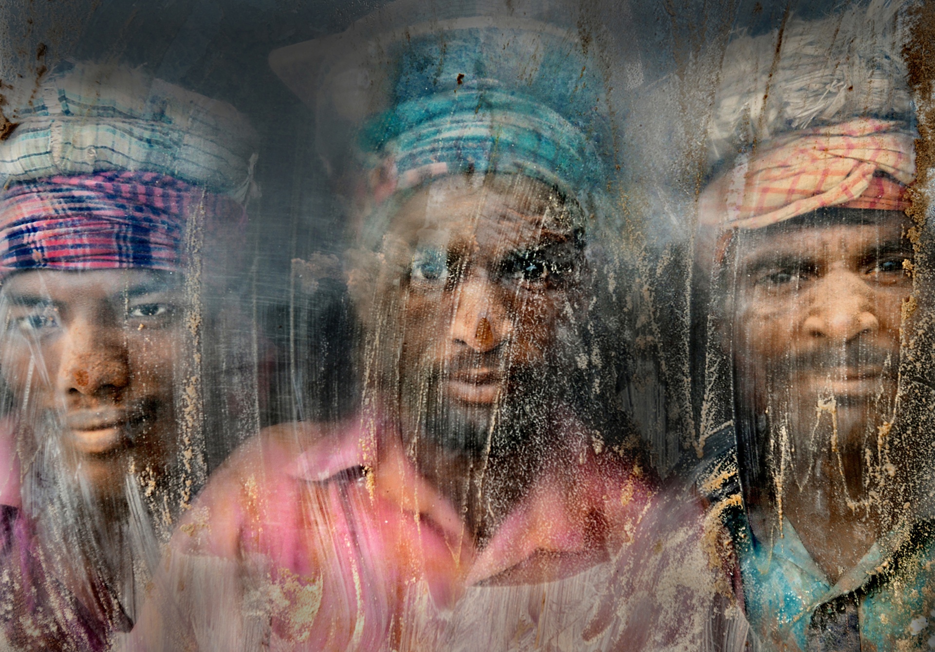 Three gravel workmen are looking through the window at work place Chittagong, Bangladesh (Faisal Azim)
