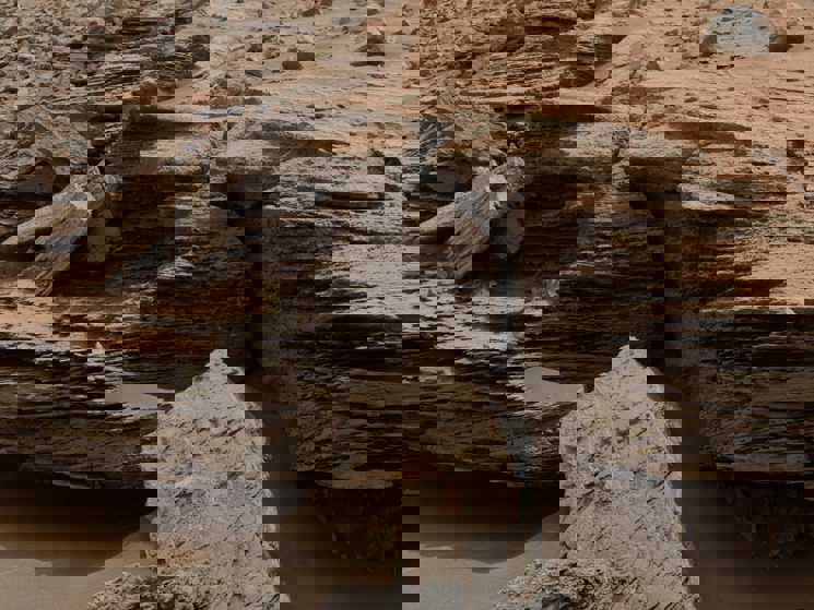 An example of cross-bedding, the result of water passing over a loose bed of sediment.