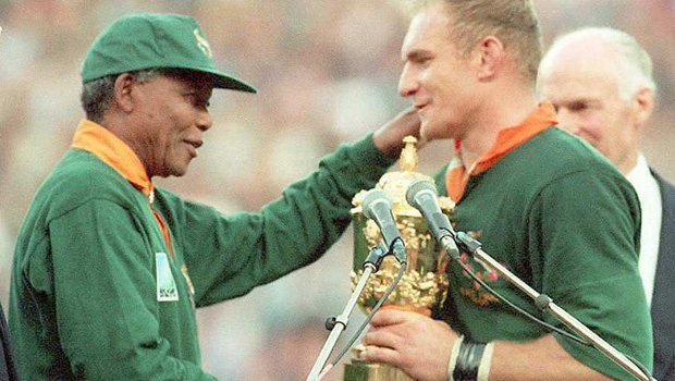 2) Nelson Mandela presenting the trophy to Francios Pienaar in 1995 - a symbol of unity in post-apartheid South Africa (23.5%) 