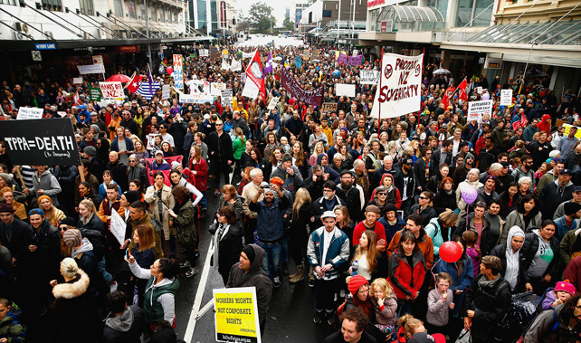 Anti TPPA protestors march down Queen Street (Getty Images) 