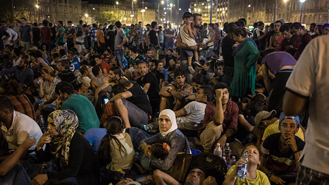Record numbers of migrants gather in front of Keleti station in Budapest, Hungary. 