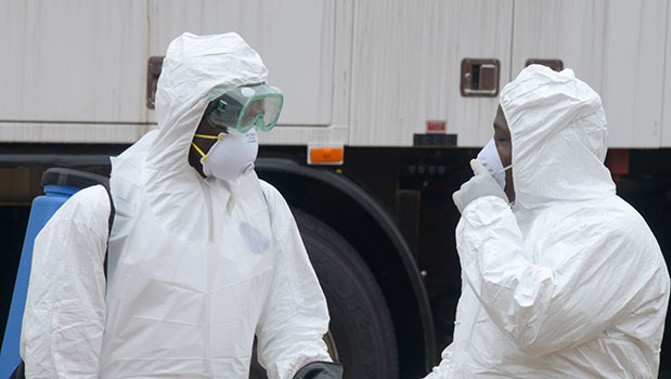 Ebola protected workers in Liberia (Getty Images)