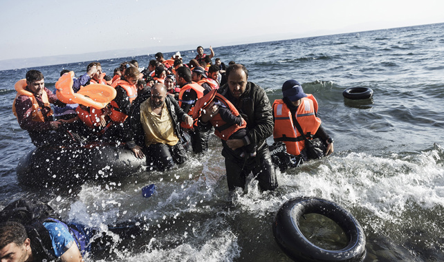 Refugees from Syria arrive on the coast of Greece, September 3 (Getty Images) 