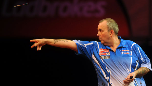 Phil Taylor - Darts. Phil 'The Power' Taylor has a whopping 16 World Championship titles, and more than 200 pro tournament wins. 