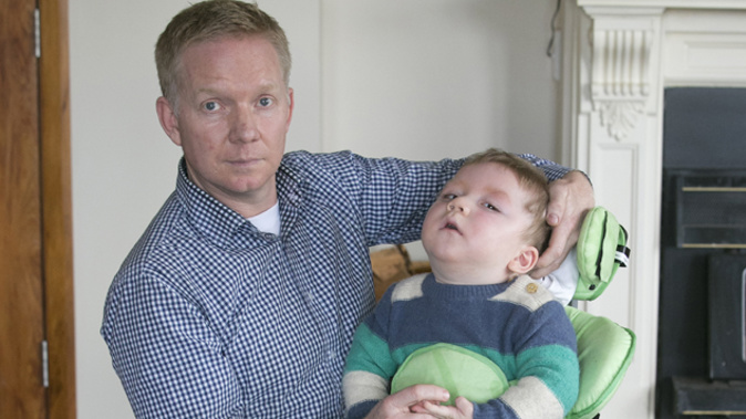 Derek Burton with his two year old son William (Supplied)